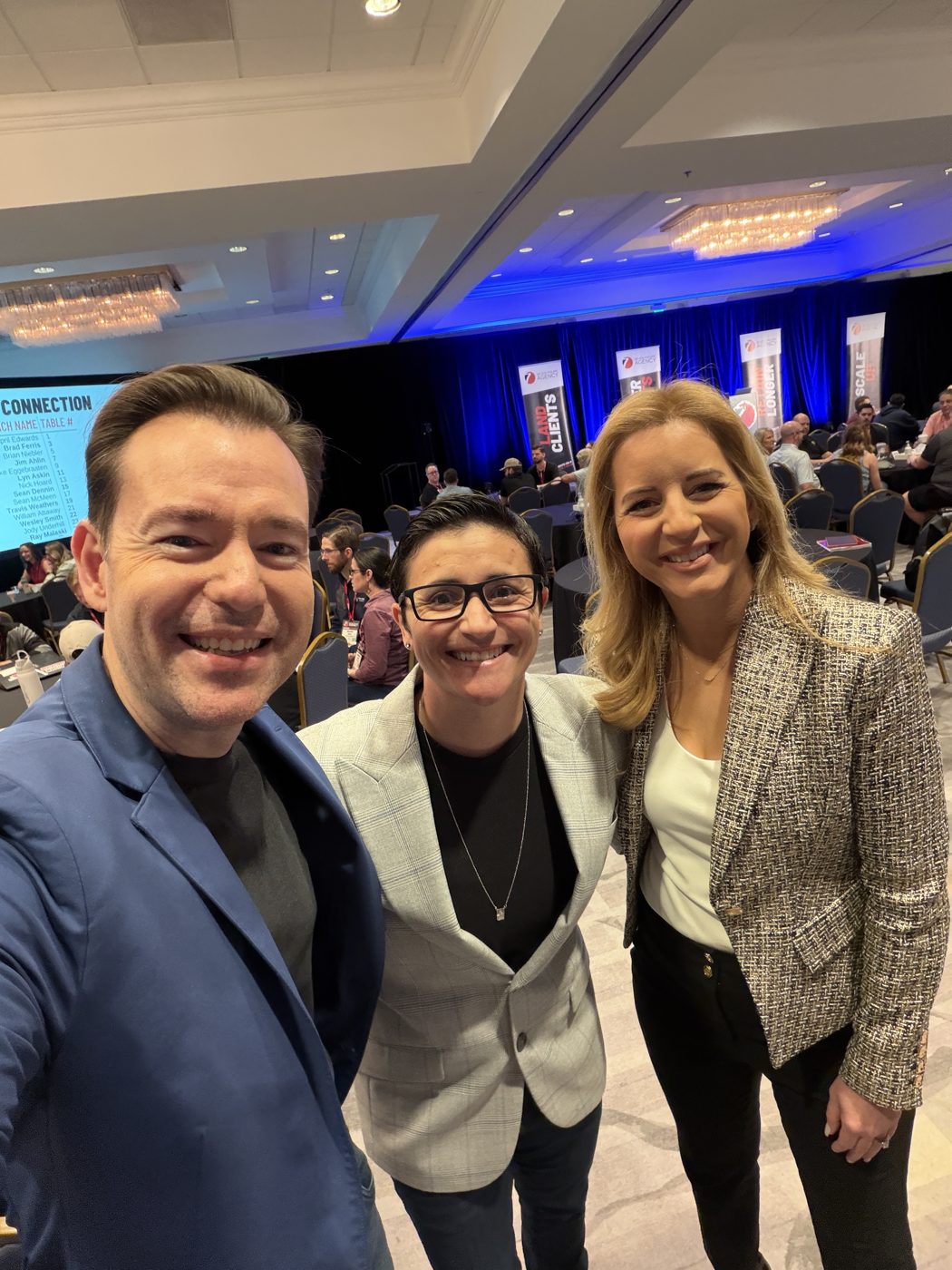 Cris with Josh and Yesenia Nelson at a Seven Figure Agency event