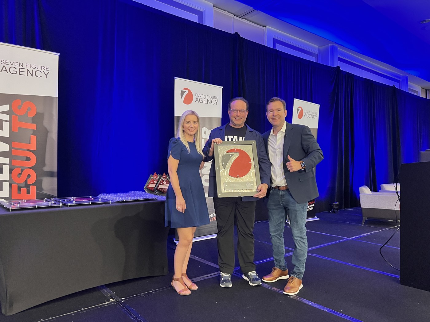 Accepting an award on stage with Josh and Yesenia